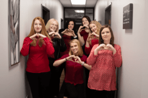 Light Alive Marketing women wearing red shirts for Wear Red Day Heart Disease Awareness