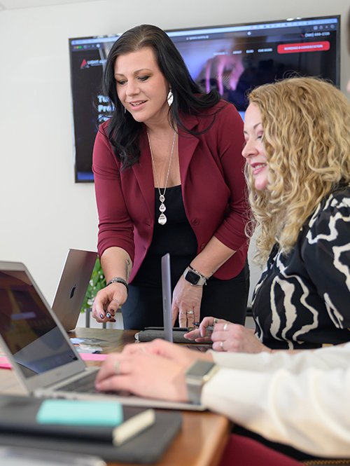 Marketing team helping a client